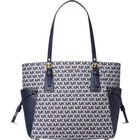 michael kors large east west signature tote|signature voyager east west tote.